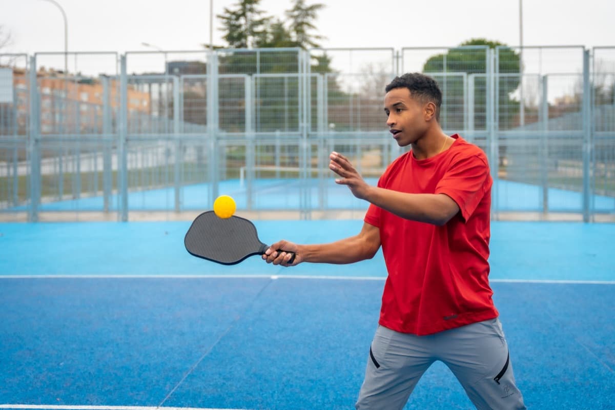 A player meeting the ball on a forehand
